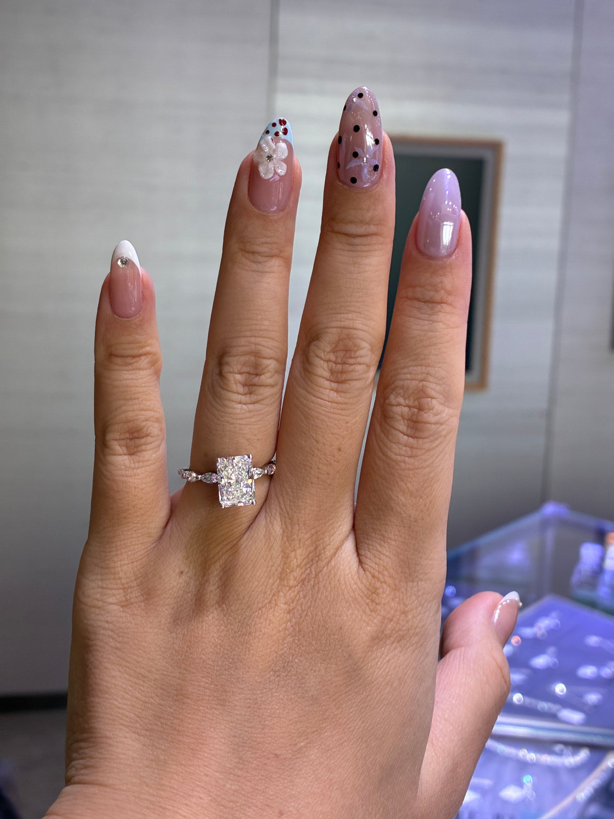 For baybee, 3ct Radiant mainstone with 0.514ct marquis sidestones, E/VVS2, in 14k white gold