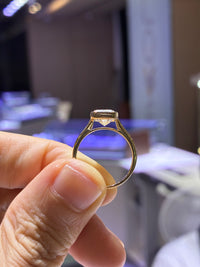 For Shelby 2.62 carats D/VVS2 radiant bezel in 14k yellow gold