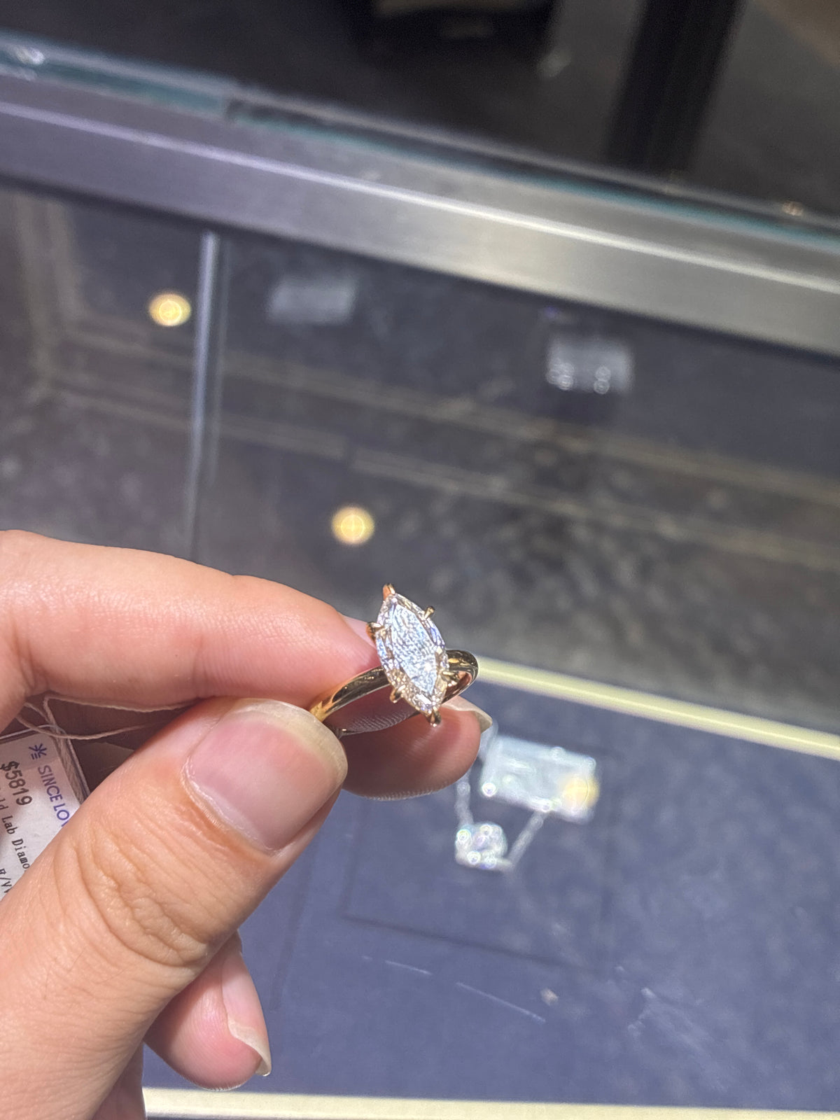 For Laiken, main stone marquise cut 3.08ct E/VVS2