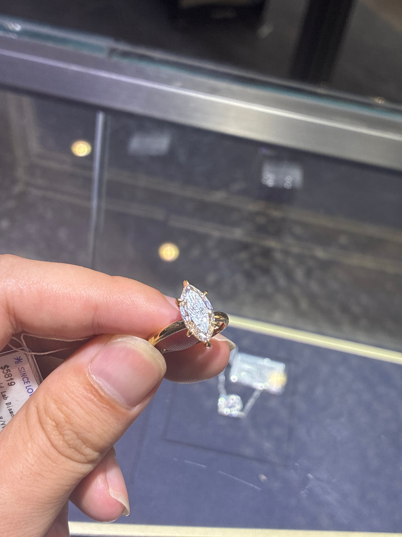 For Laiken, main stone marquise cut 3.08ct E/VVS2