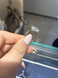 The remain balance for Devon, 14k gold emerald cut 3carat two tone, E/VVS2