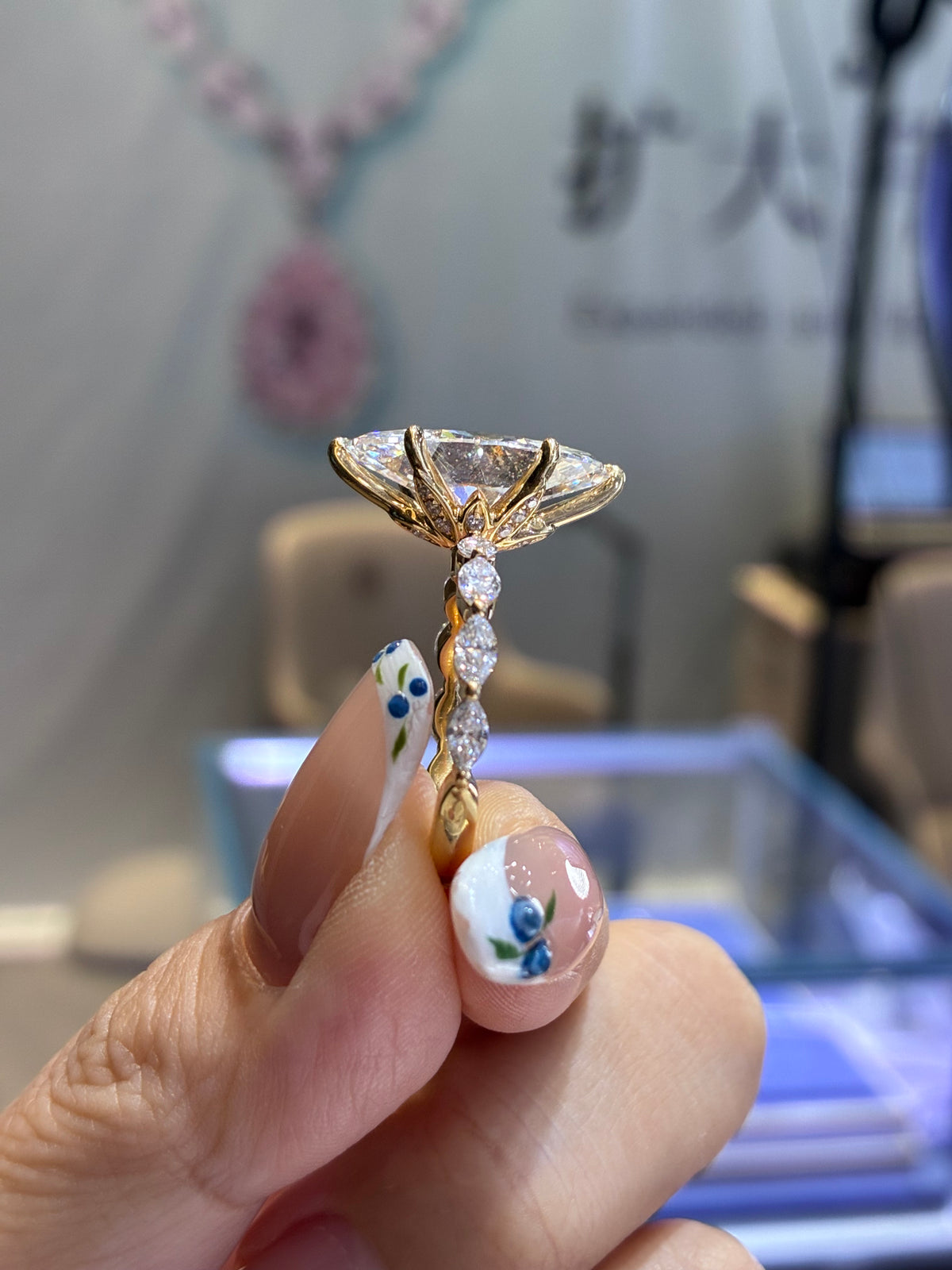 For Bless, deposit for 5ct Moval, E/VS1 with 1ct sidestones in 14k yellow gold