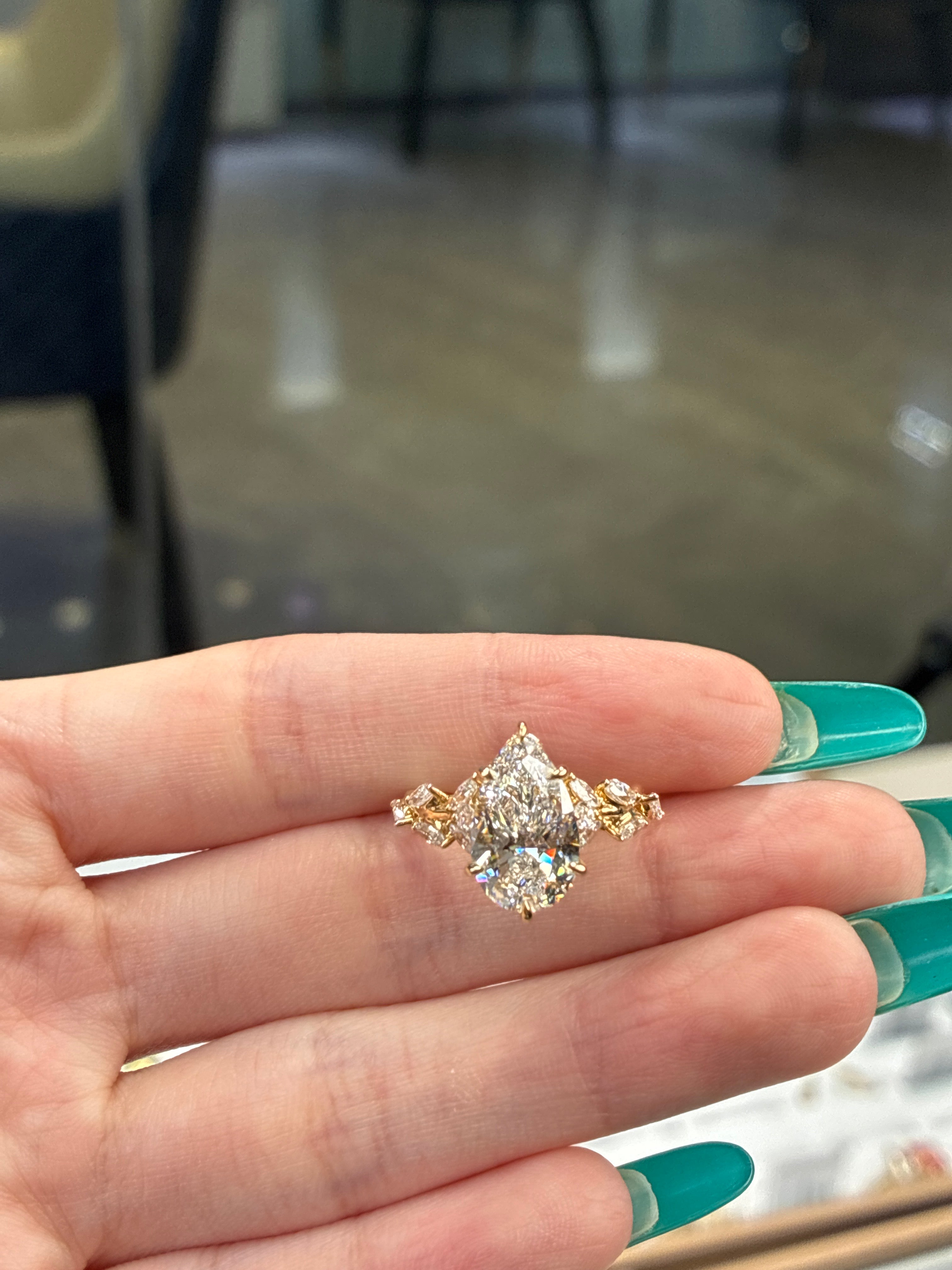 Deposit For Eulamae Tenison 14K solid yellow 3.06ct pear E/VS1 with 1.009ct side stones