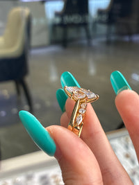 For Andrea                                 •14K solid gold 2.51ct E/VVS2 with 0.05ct side stones(ready to ship).                                           •14k solid gold with 0.50cr marquise with round bubble band(custom)