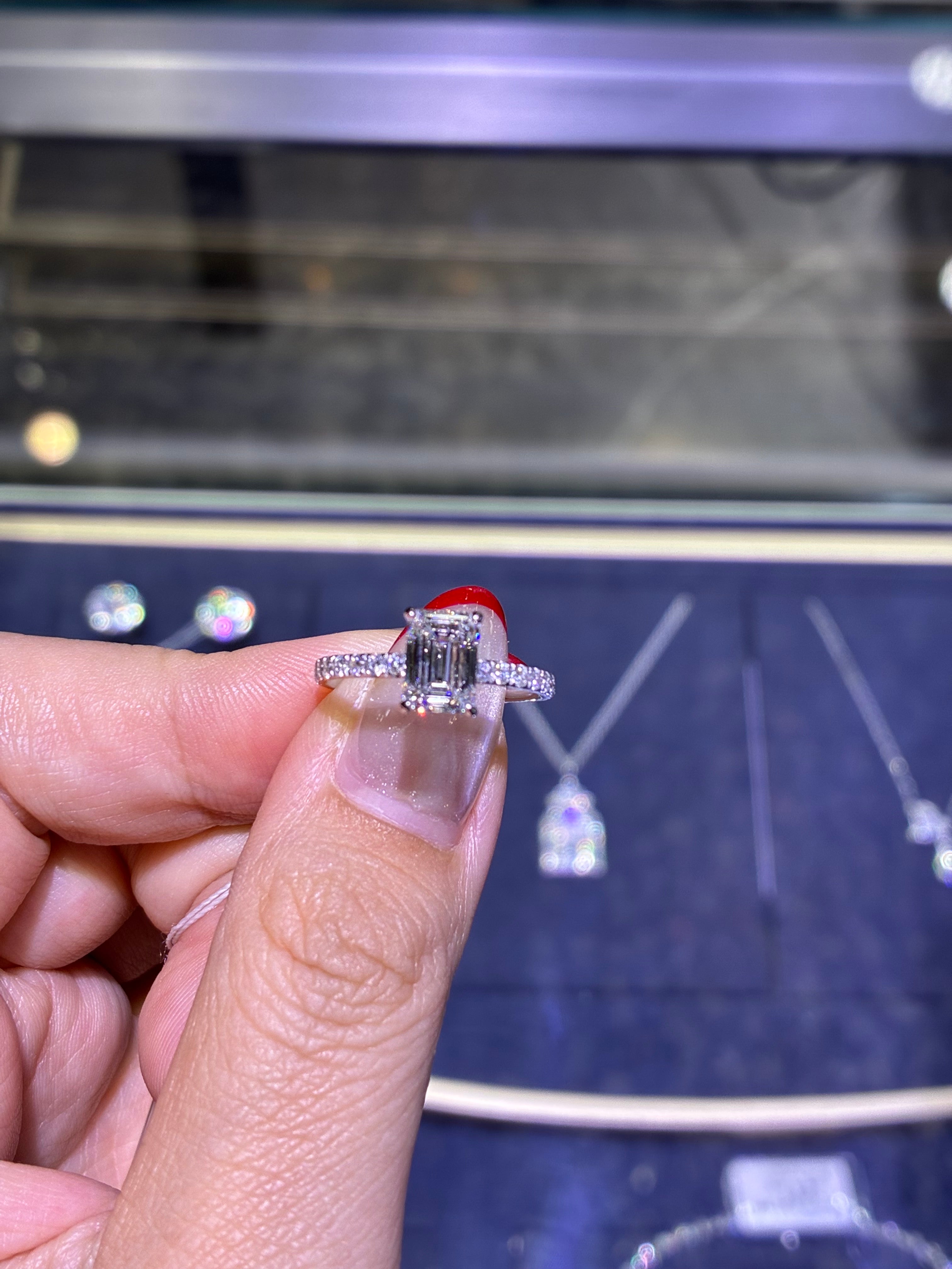 1.430carat Emerald Solitaire Ring with 0.313ct sidestones(D/VVS2)