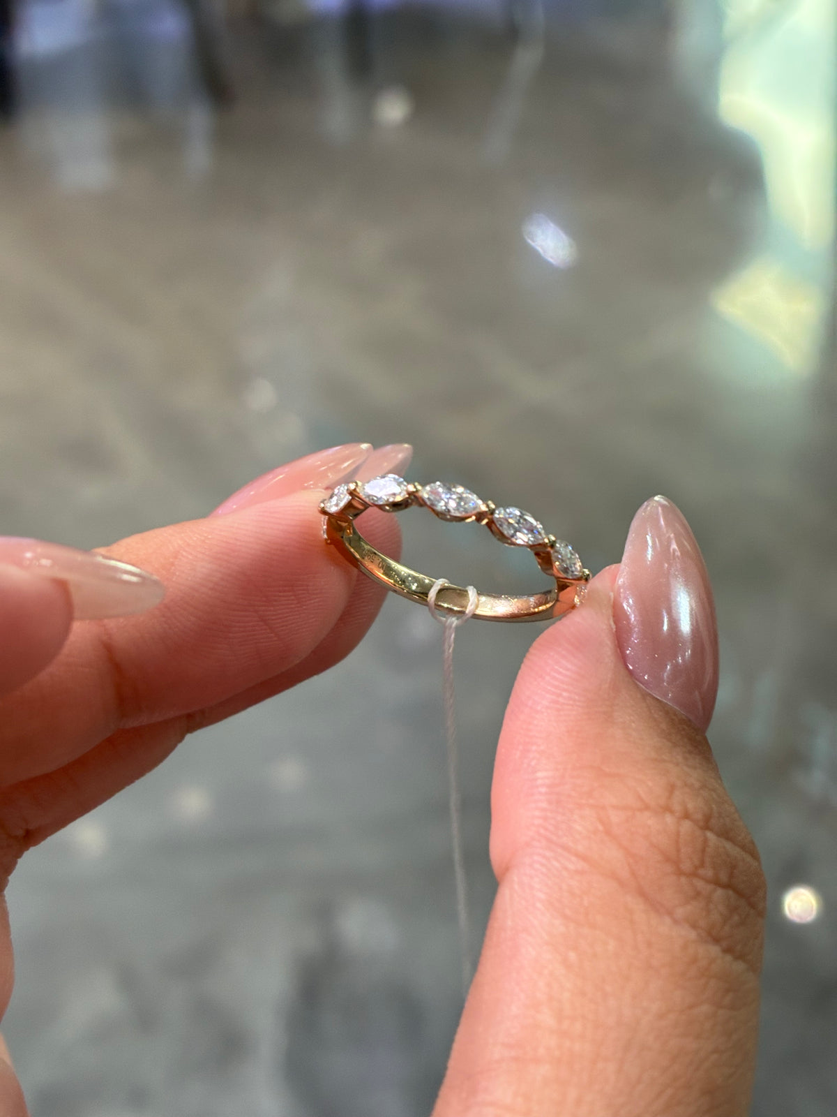 Deposit for Rahma platnium setting 2.5ct marquise ring with 0.4ct side stones, + platnium band with 0.6ct marquis diamond