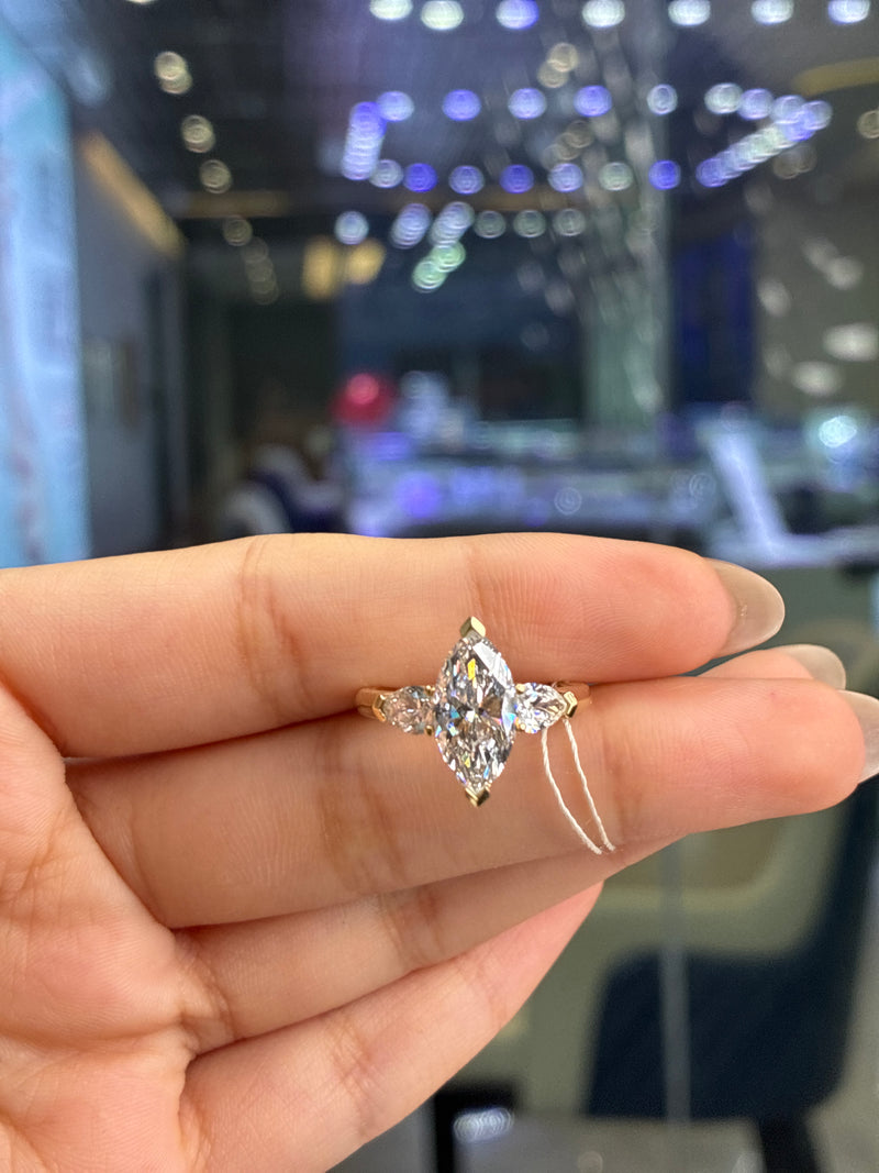 For 🐟 14k yellow gold, 2.01ct marquise center stone, 0.637ct side stone, E/VS1
