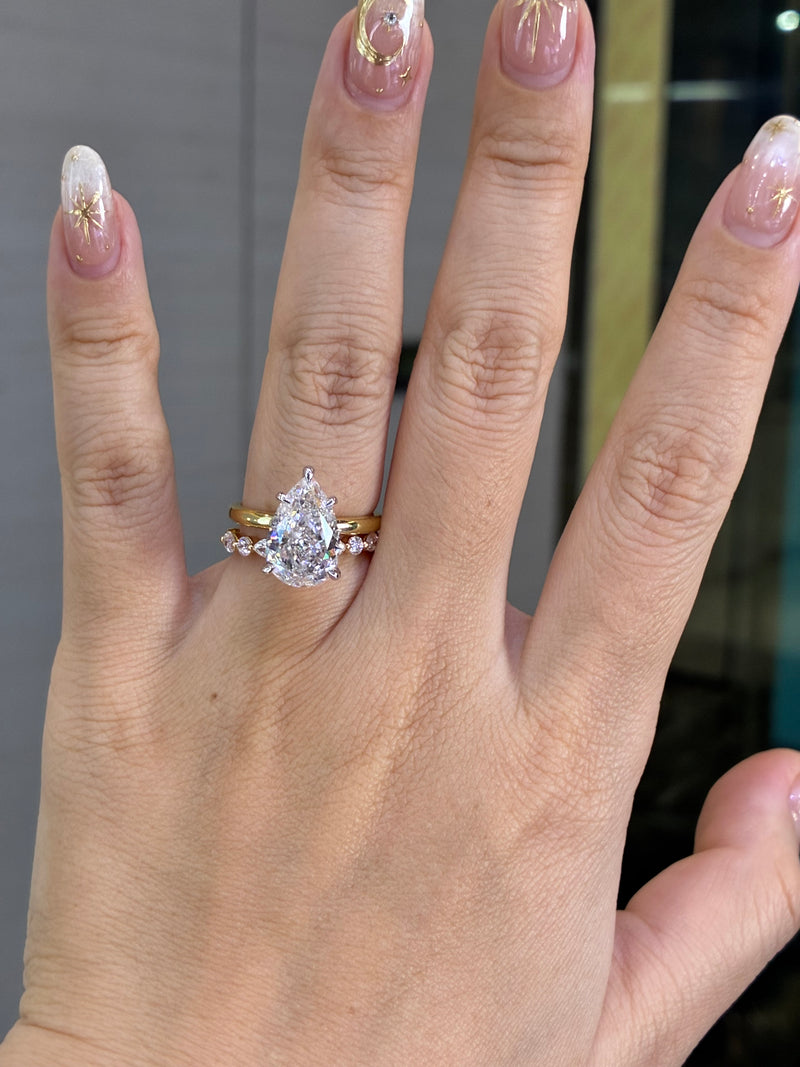 For Cathy, 5.03ct Pear Solitaire Ring + 0.569ct marquis Band E/VVS2 in 18k gold