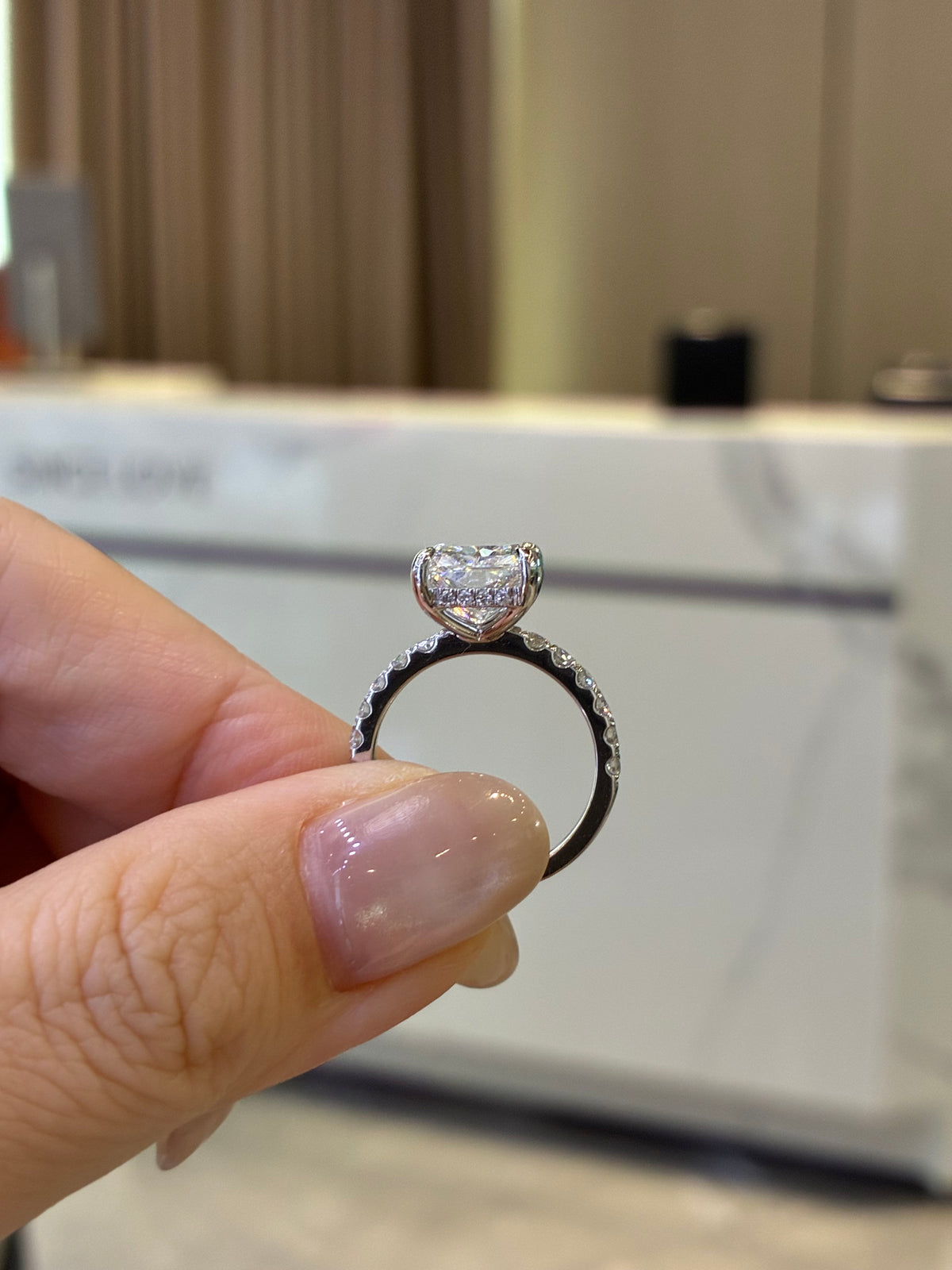 For Daisy, deposit for 4.5ct Radiant with 0.5ct sidestones, E/VVS2, 14k white gold
