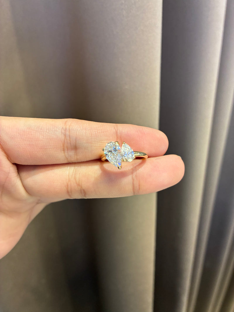 30% Deposit for Seraphina, Toi et moi design, 1.5ct plain pear E/VVS2, with 0.60ct Champagne diamond