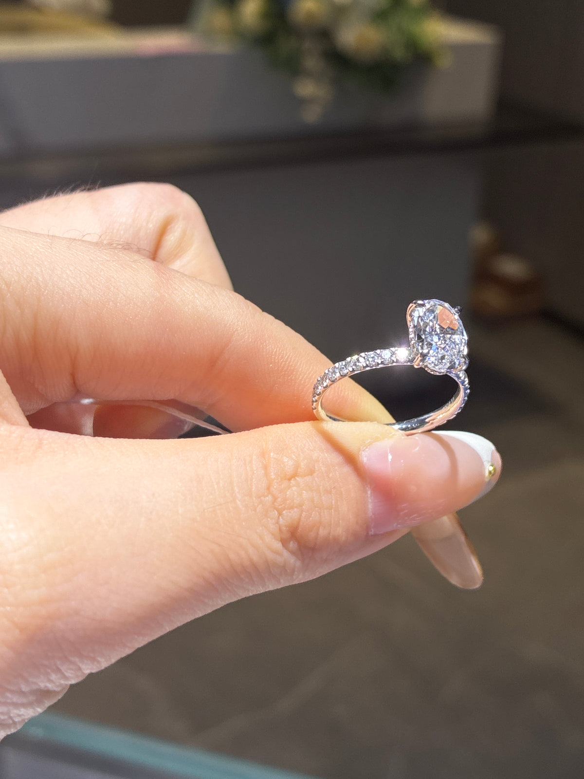 For allouise 14k white gold oval wit hidden halo ,pave design customize with 1.00ct side stones
