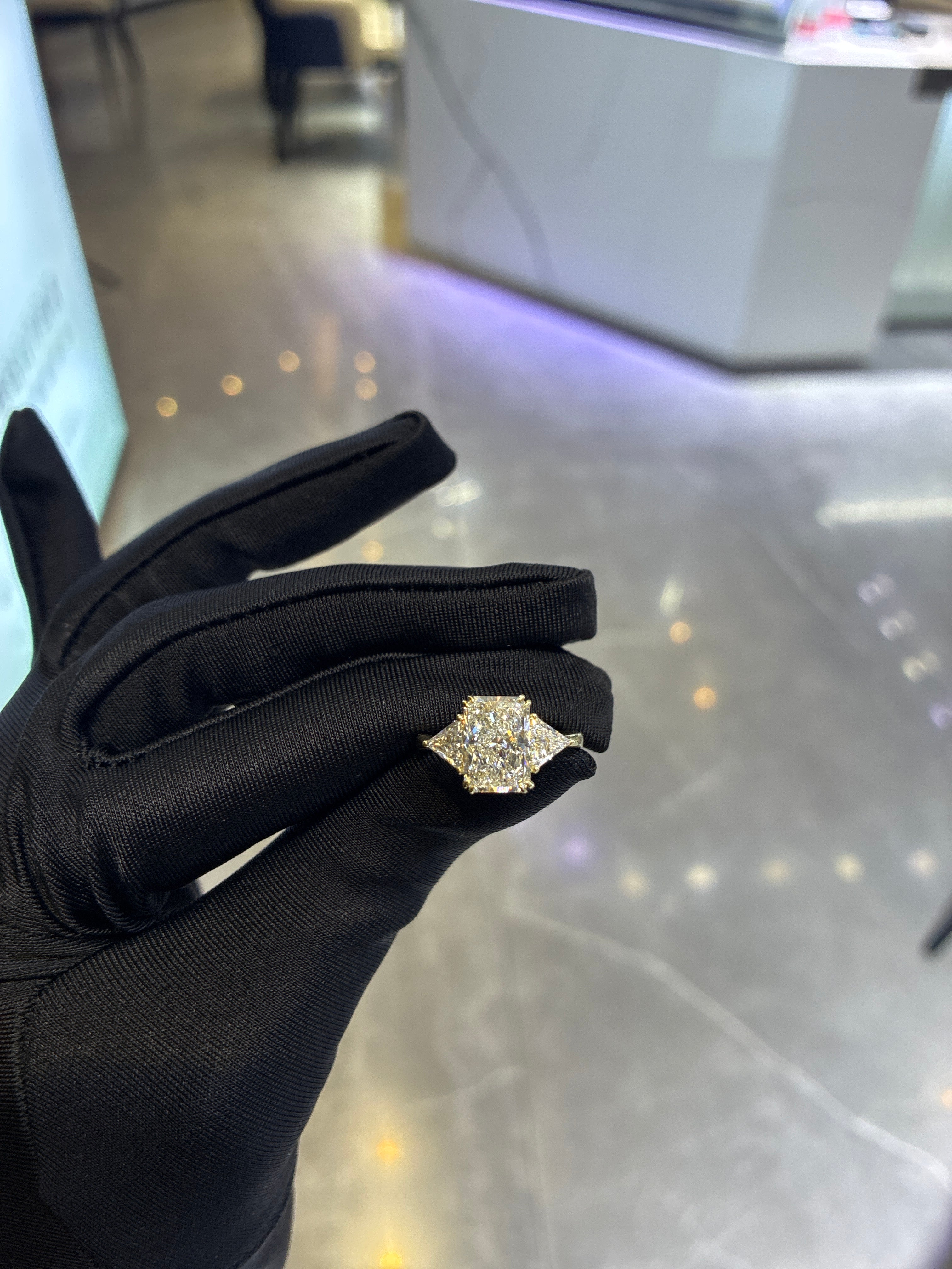 Deposit For Cielo 14K 3carat center stone Radiant with 0.695 triangle side stones E VS1
