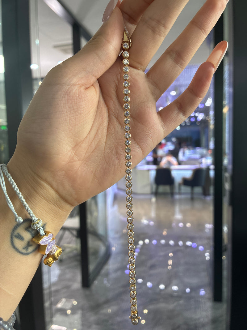 Deposit for snowy 14k yellow gold round bezel bracelet, 0.3ct for each diamond