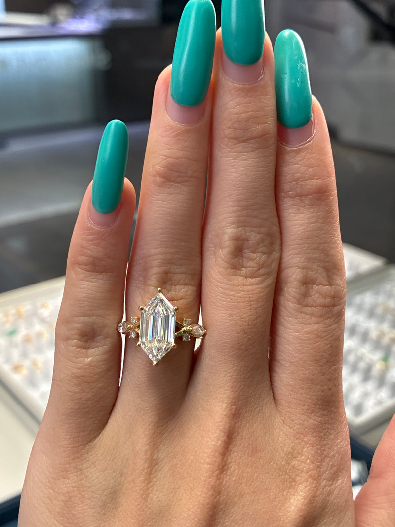 Deposit For Marisa                      •14K solid yellow gold 4.37ct marquise FIY VVS2 petal bezel setting.                                         •14K solid yellow 3ct Dutch marquise E/VS1 with 0.242 sidestones