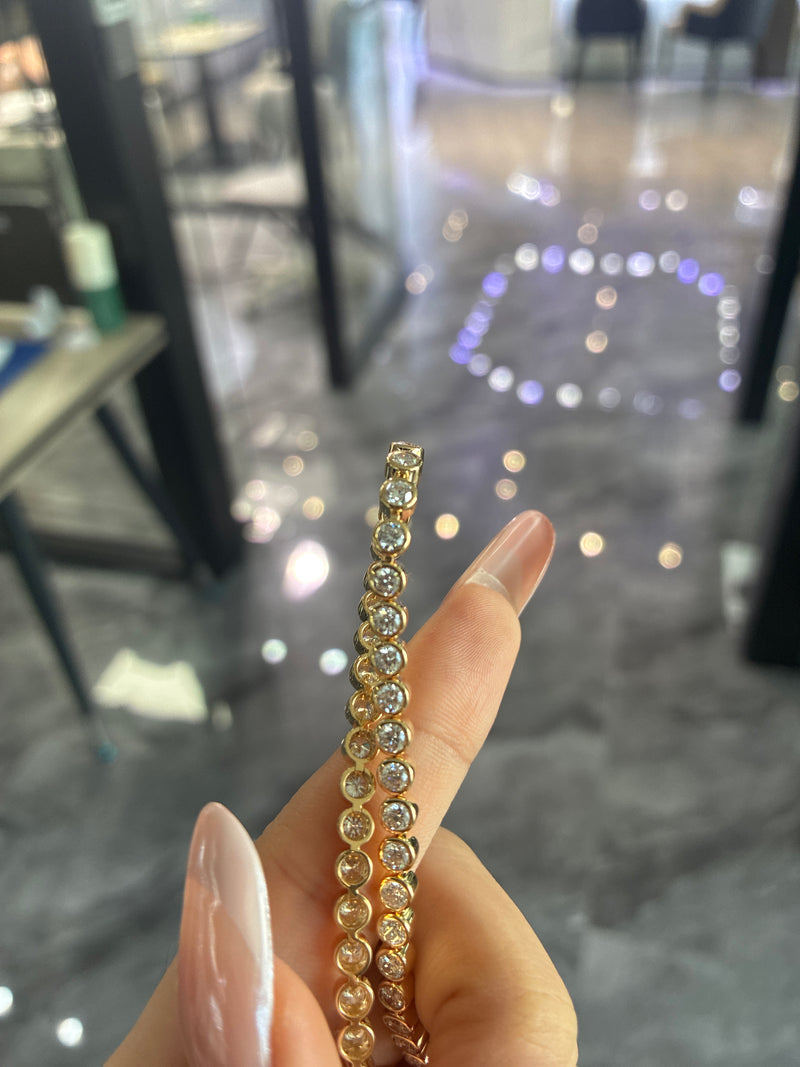 Deposit for snowy 14k yellow gold round bezel bracelet, 0.3ct for each diamond
