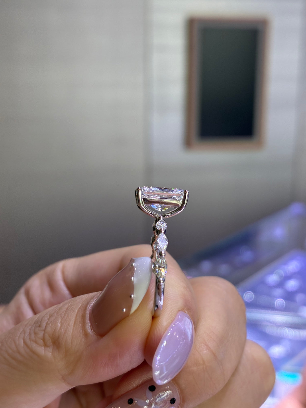 For baybee, 3ct Radiant mainstone with 0.514ct marquis sidestones, E/VVS2, in 14k white gold