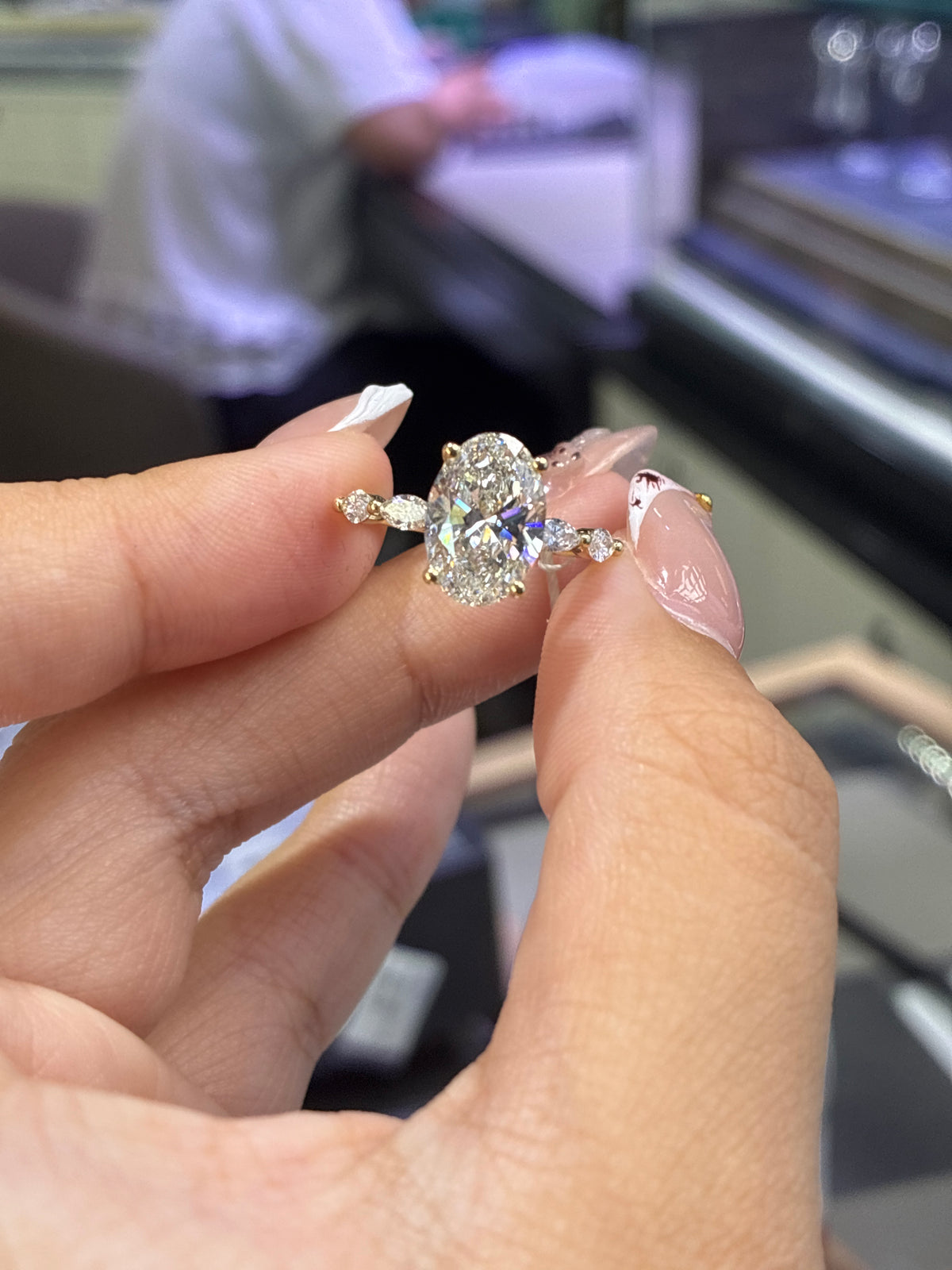 Deposit for Keala 14k 3ct oval E/vvs2 with marquise side stones on the band
