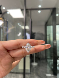 Deposit for blinkingprettyboutique 14k white gold, 4ct Moval main stone, 0.914ct side stone, E/VVS2