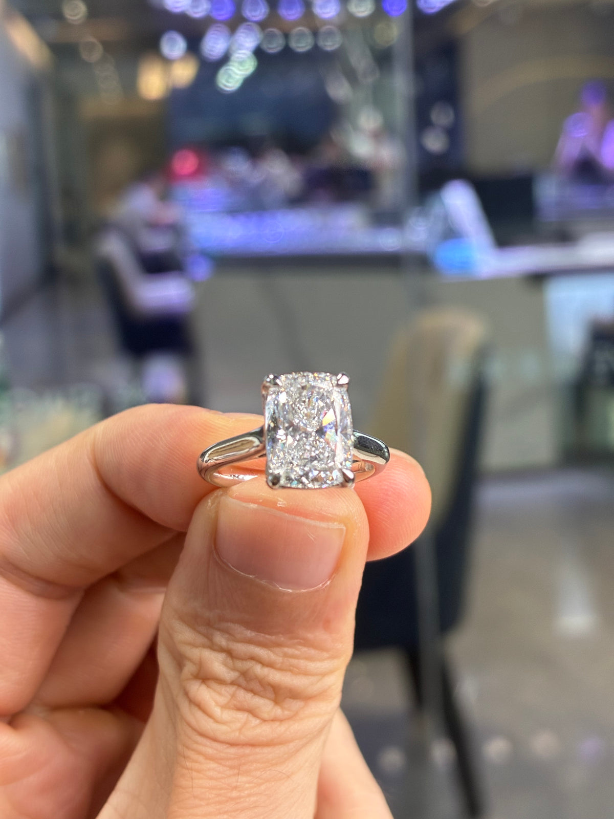 For Daisy, 3 carats Pink radiant cut diamond with tulip setting in 14K white gold