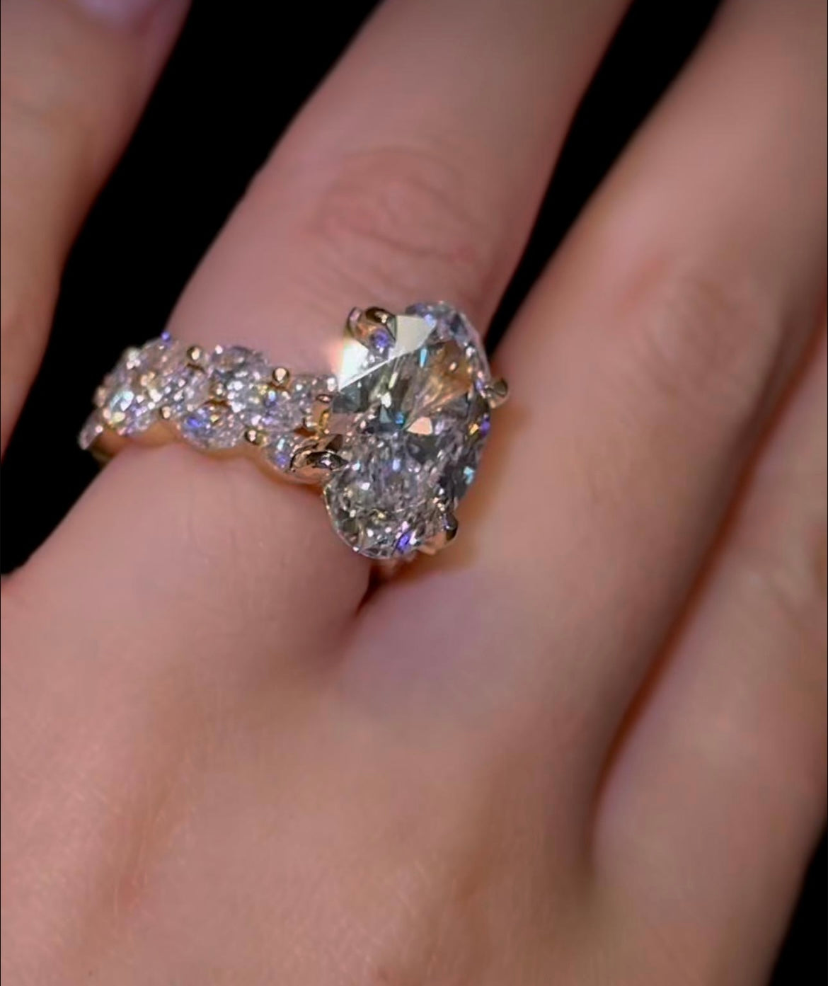 (Deposit )Custom order for Haley:
• 14K yellow gold ring with a 3.0 ct Moval diamond, 2:10 ratio, EF/VS1
• Two 14K gold half-eternity marquise diamond bands