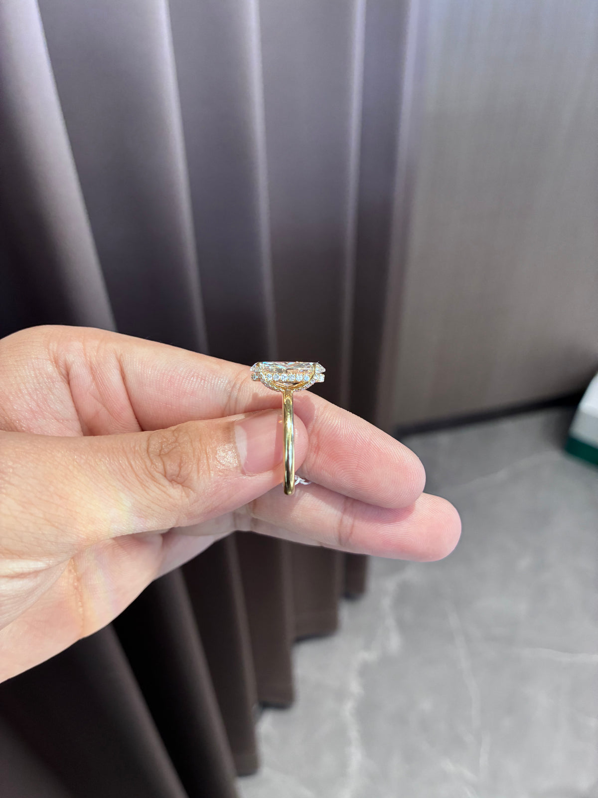 For Jesser 14k yellow gold ring with 3ct moval diamond And 0.331ct side stone