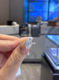 For Karina, 3.1ct oval with 0.48ct sidestones, D/VS1, 18K yellow gold