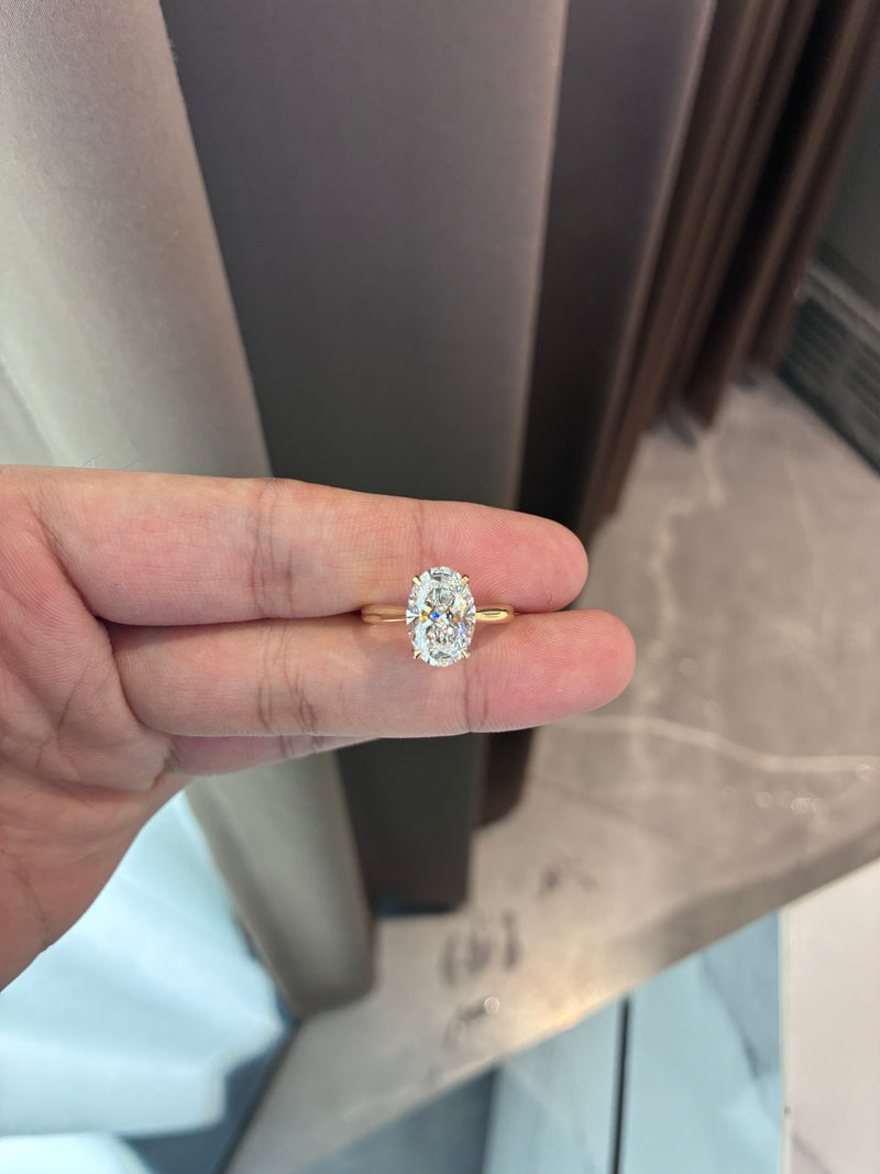 For daria 14k yellow gold ring with 3.03ct main diamond And 0.113ct side diamonds