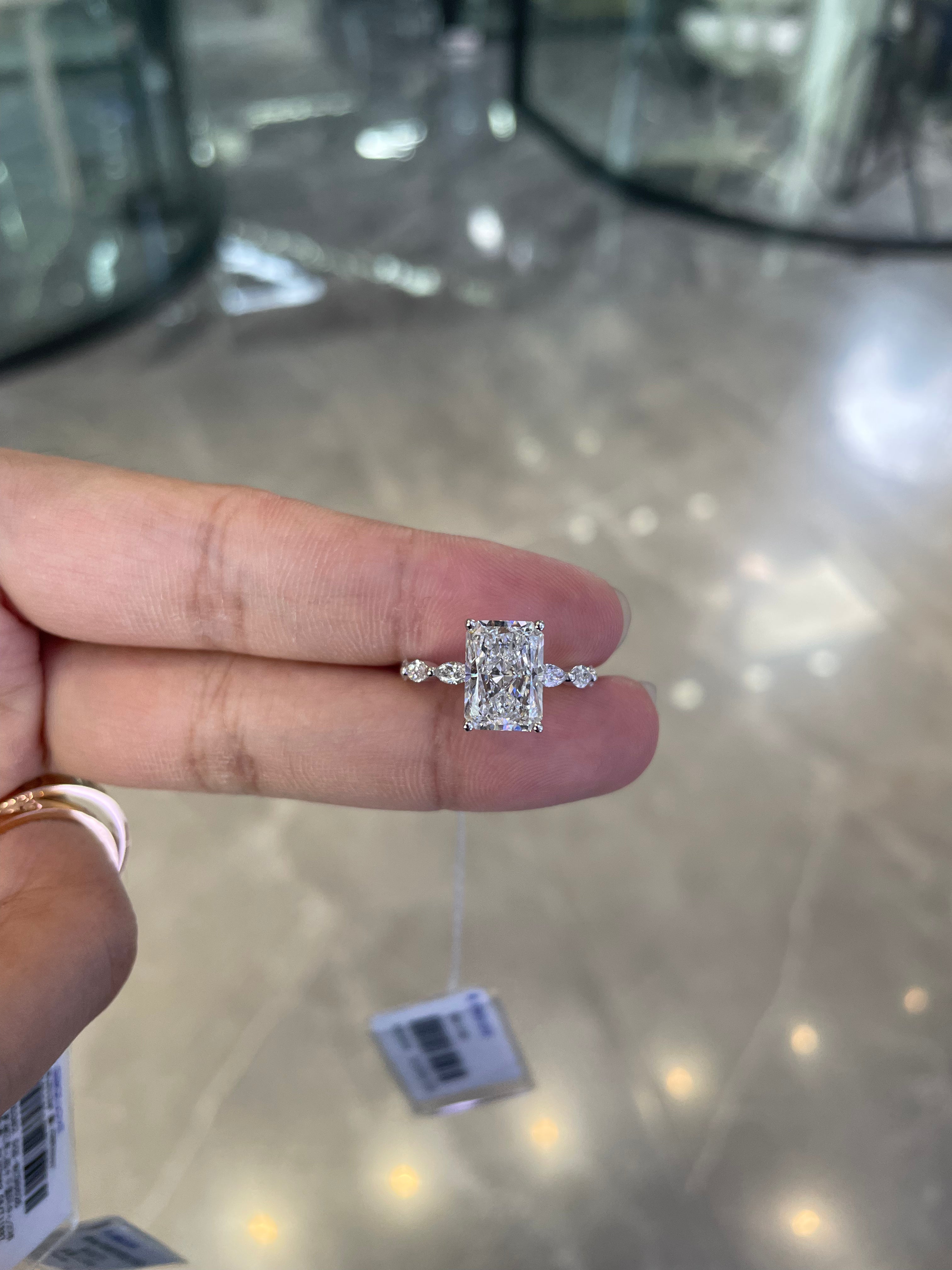 For Autumn 14k white gold ring with 3ct radiant diamond And 0.514