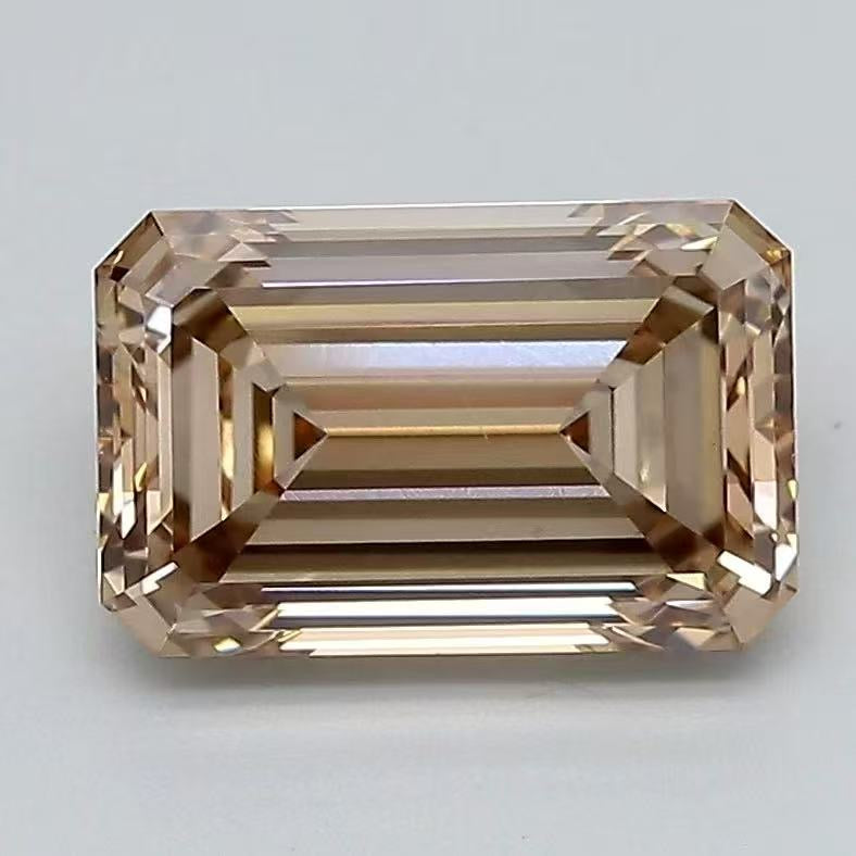 For junue 0, 3.03ct light brown emerald cut loose stone, VS1