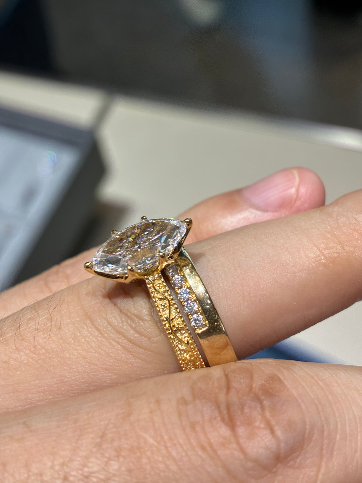 3 carat 18k gold marquiss ring and 14k, 0.323 carat eternal ring