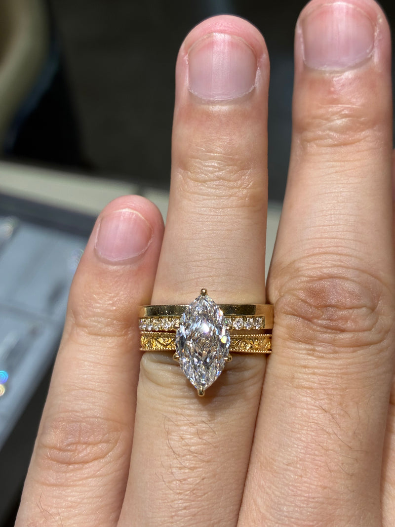 3 carat 18k gold marquiss ring and 14k, 0.323 carat eternal ring
