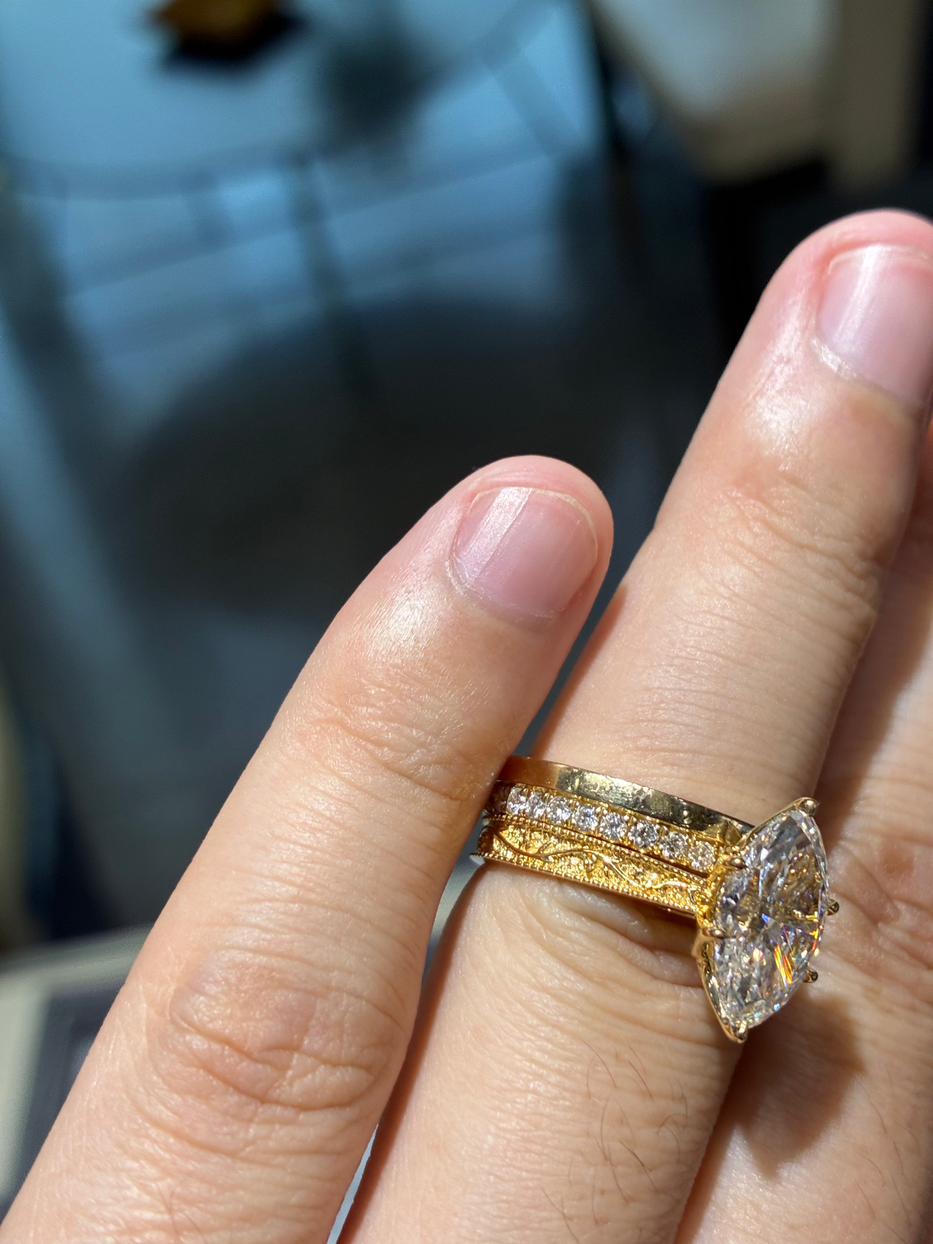 3 carat 18k gold marquiss ring and 14k, 0.323 carat eternal ring