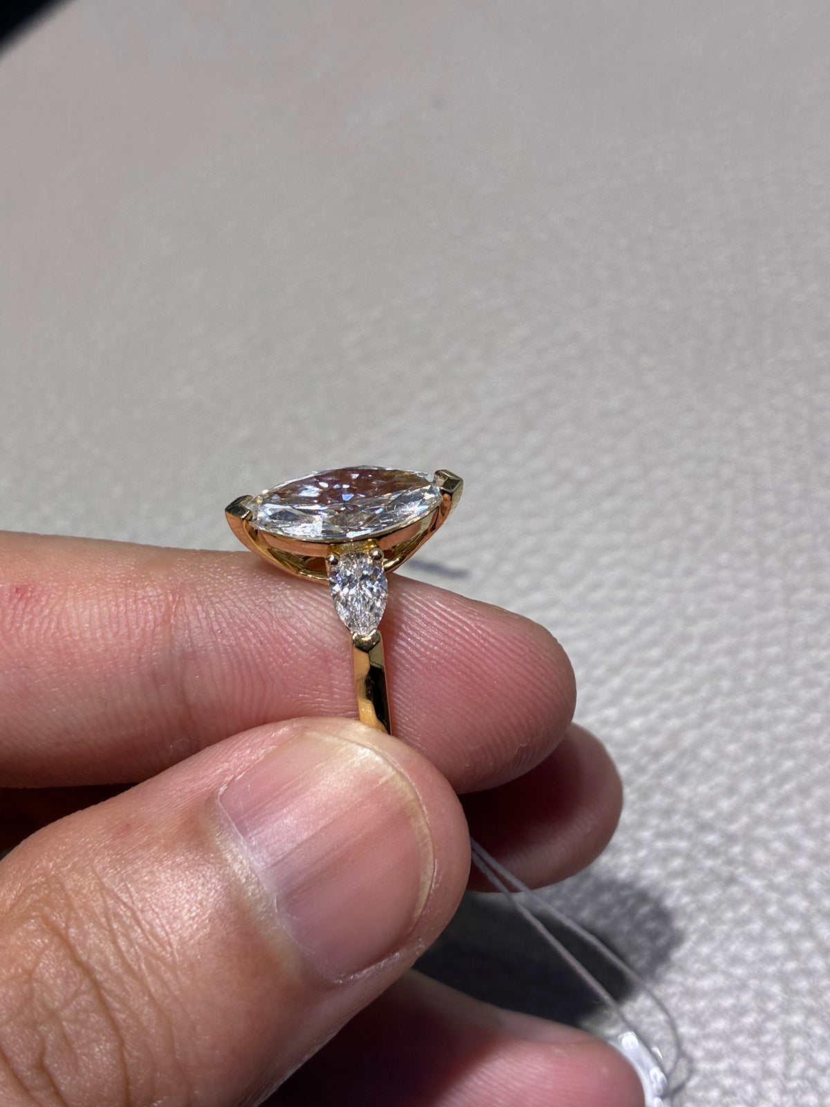 Mimi for pay (14k 2 carats Marquis three-stone diamond ring)