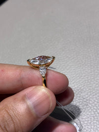 Mimi for pay (14k 2 carats Marquis three-stone diamond ring)