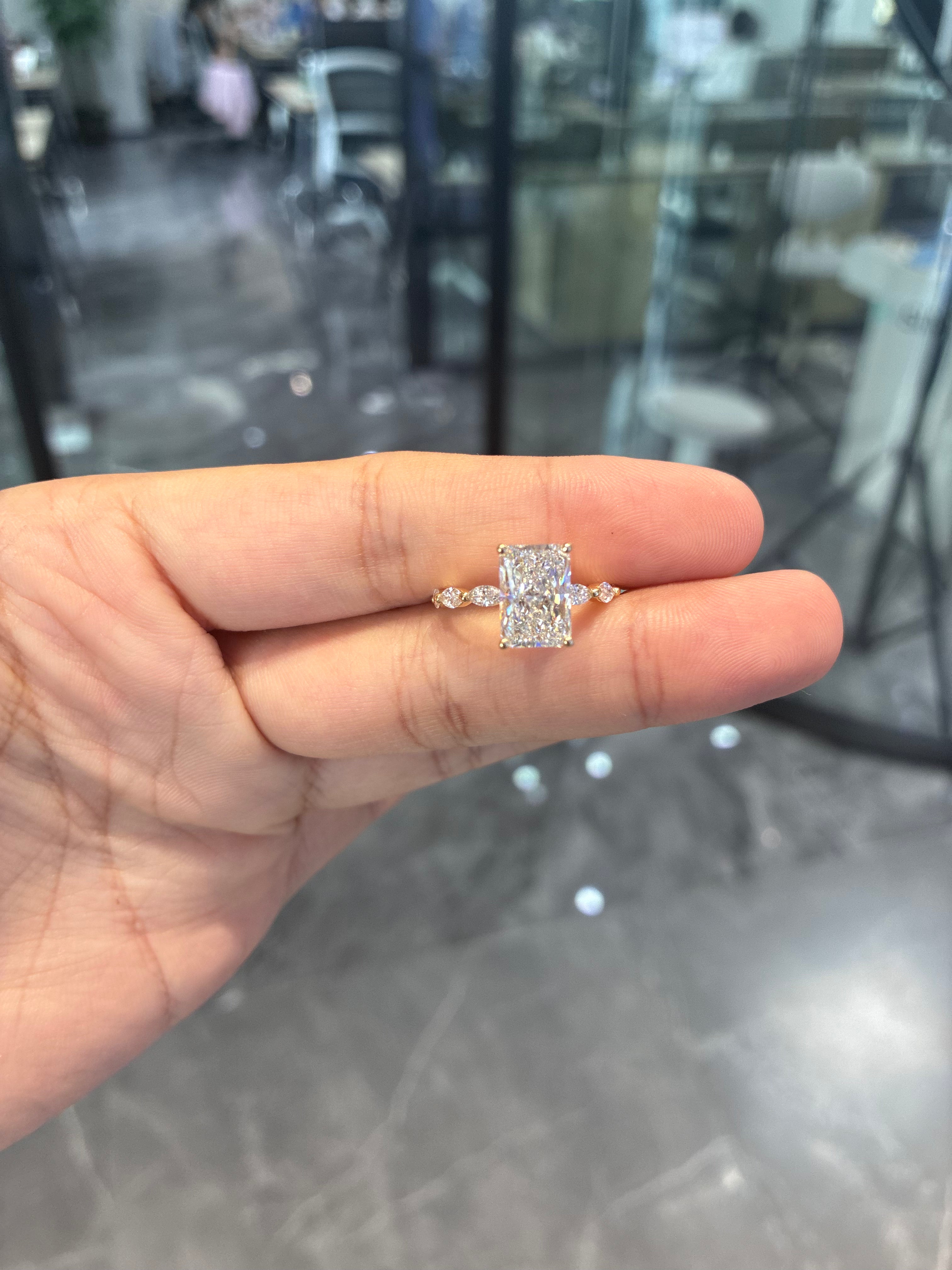 For N 14k yellow gold ring with 5ct radiant diamond