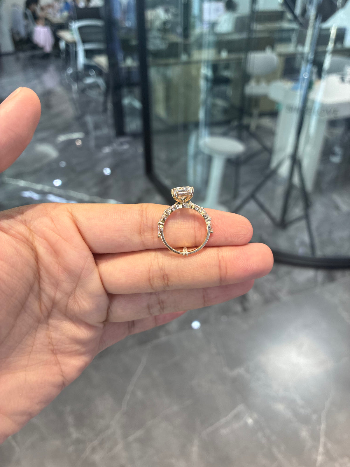 For N 14k yellow gold ring with 5ct radiant diamond