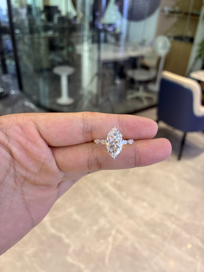 For Mo 14k white gold ring with 4ct marquise diamond And 0.9ct side stones