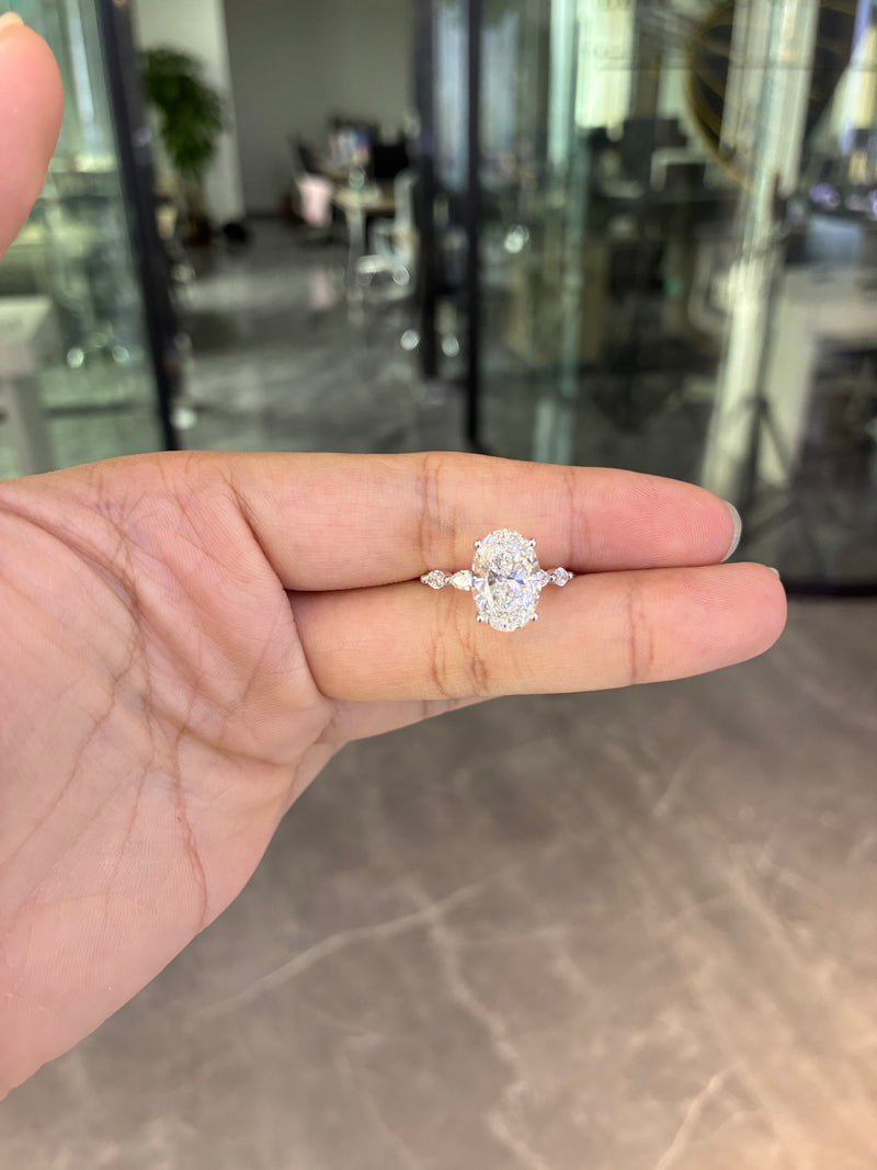 For Syd 14k white gold ring with 4ct D vvs2 oval diamond And 0.579ct side stones