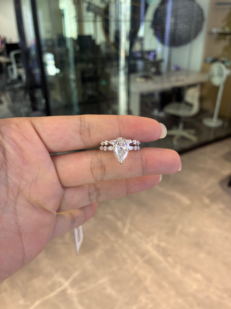 For Grandmother of 7  ready to ship 14k white gold band with 0.540ct diamonds And 14k white pear cut 3ct E vvs2 diamond ring
