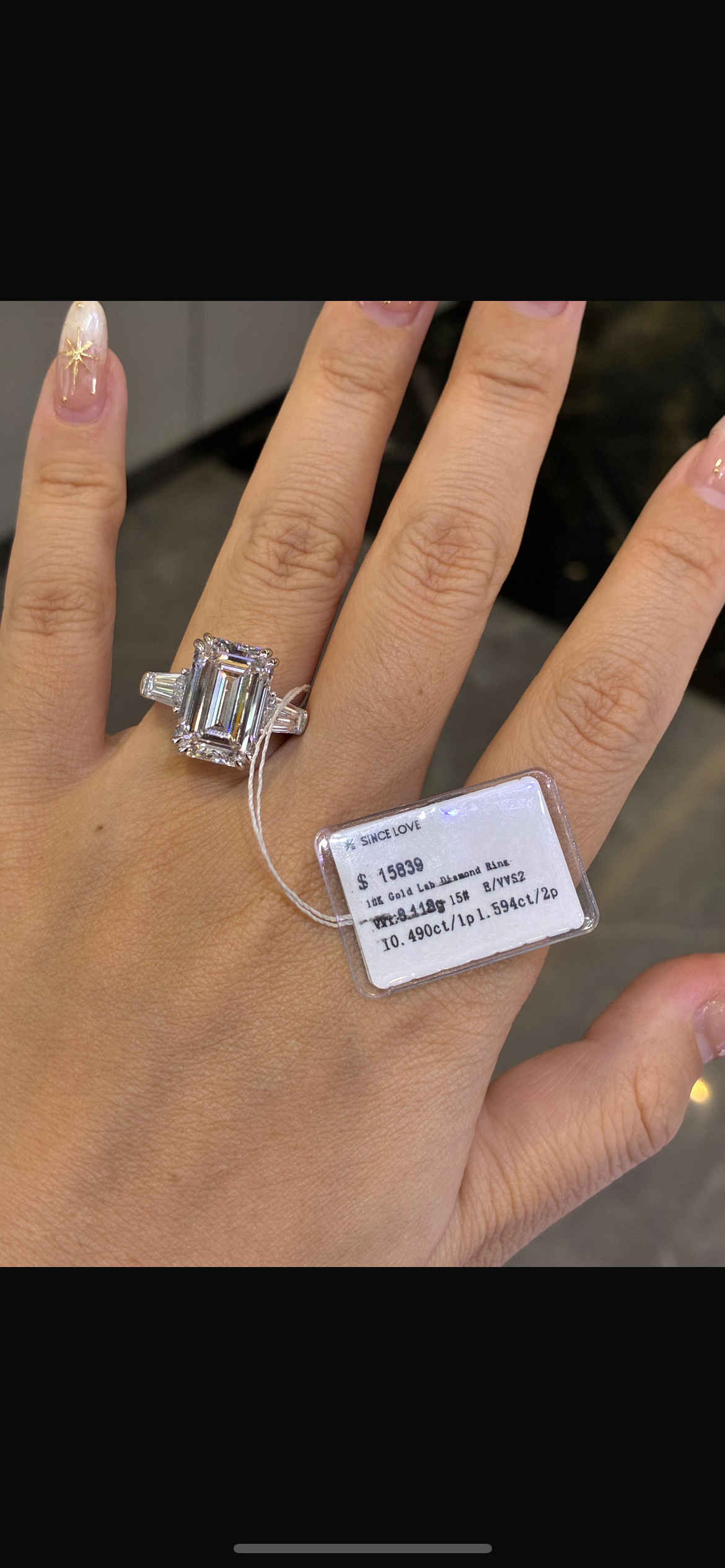 For Jen Sangera 18k white gold with 10.490ct main diamond and 1.594ct/2p side diamonds