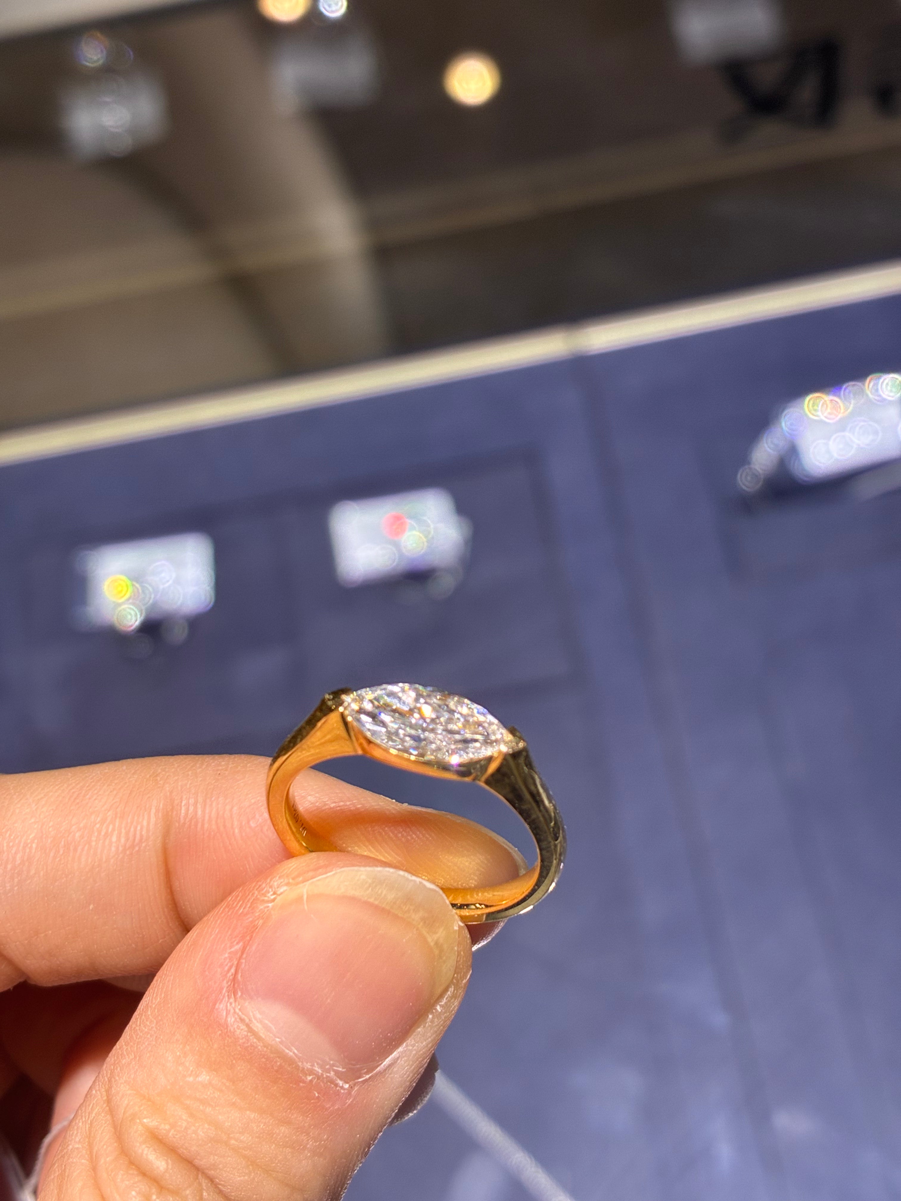 For Ruby (Marquise cut, 1.03 carat, D color, VVS2 clarity, set in 18K gold )