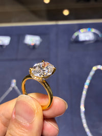 For Jennifer Chaparro (14K gold band, 4.283 ct, D–E color, VS clarity 14K gold oval, 5.0 ct, E color, VVS2 clarity ）