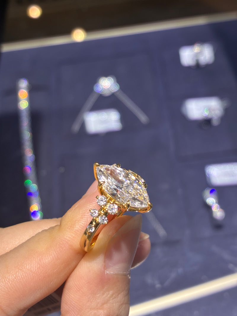 For Mindy Lou Deposit (14k gold, 3.01-carat marquise-cut diamond, D color, VS1 clarity.)