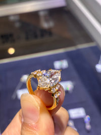For Mindy Lou Deposit (14k gold, 3.01-carat marquise-cut diamond, D color, VS1 clarity.)