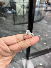 For its me 14k white gold ring with 4ct E vvs2 and 0.645ct side stones