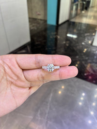 For Dianna O. 18k white gold ring with 2.050ct D VVS2 main diamond and 1.210ct side diamonds need engraving