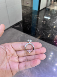For Dianna O. 18k white gold ring with 2.050ct D VVS2 main diamond and 1.210ct side diamonds need engraving