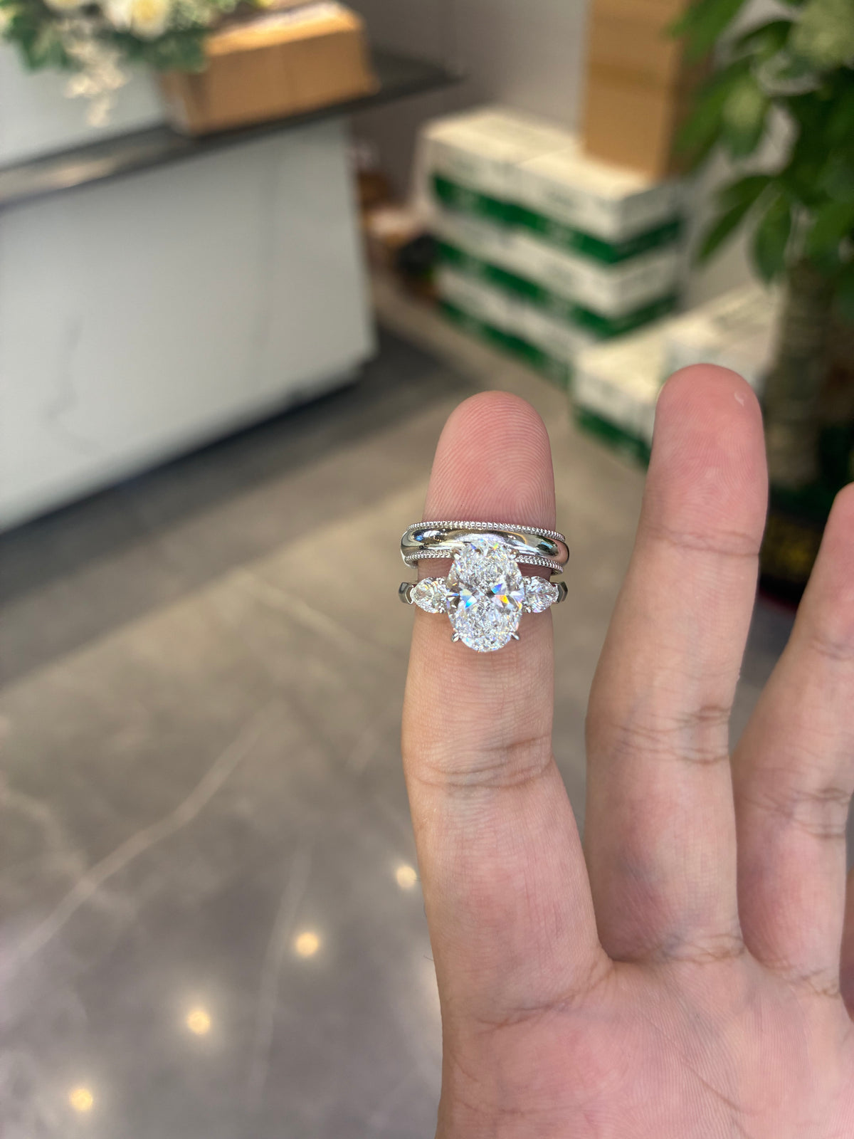 For user1680024449362 18k white gold ring with 3ct D VVS2 main stone And 18k white gold band