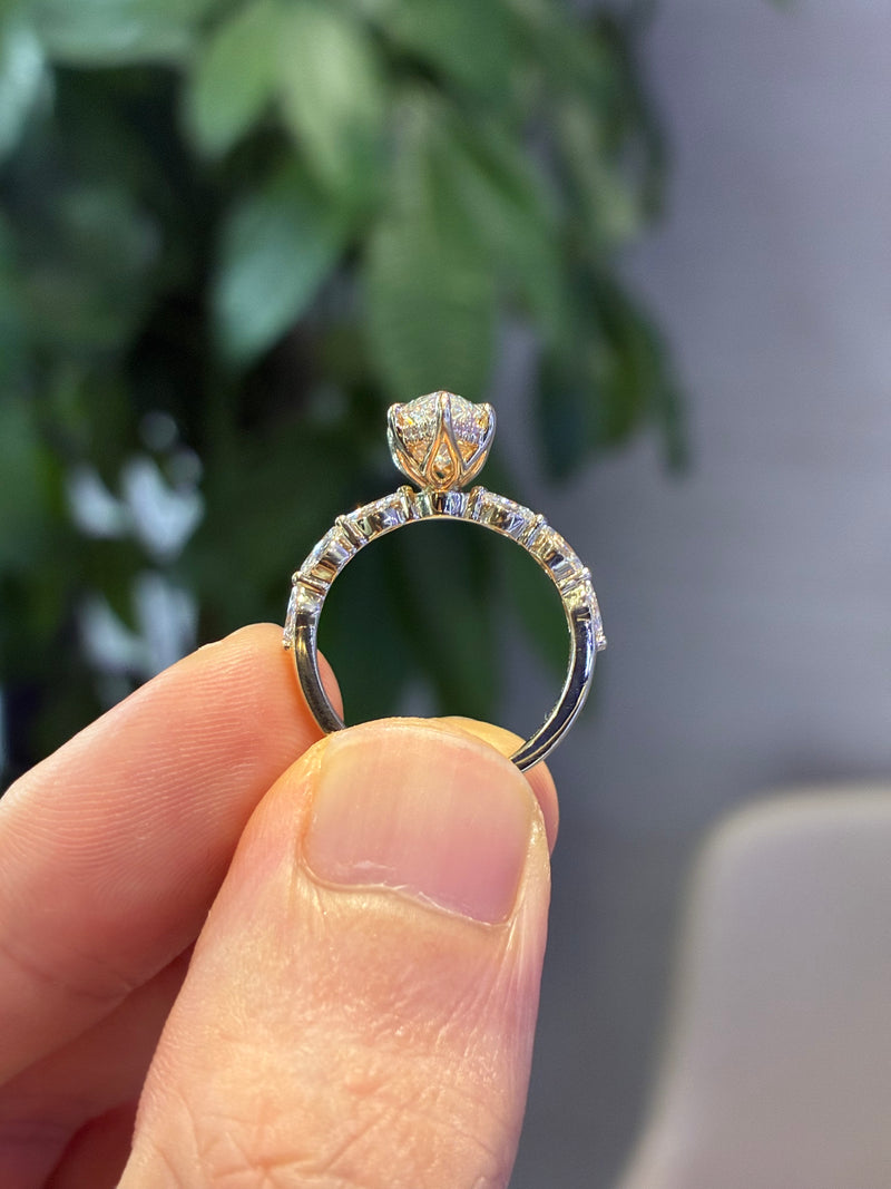 2.03 carats marquis E/VVS2 with 0.442 total carats side diamonds in 26 pieces in 14k yellow solid yellow gold
