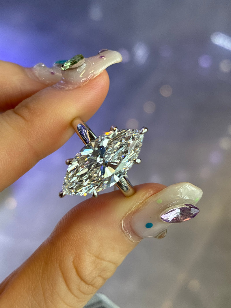 Deposit for Ceylink, 5ct marquise ring , E/VVS2, plain band with side stone   , 14k yellow solid gold, IGI Certified, $4055